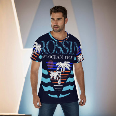 Man wearing all-over print men's O-neck t-shirt with palm tree and ocean design, breathable jersey fabric, casual fit.