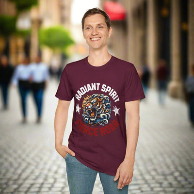 Man wearing burgundy fierce animal statement graphic t-shirt with tiger design and "Radiant Spirit, Fierce Roar" text.